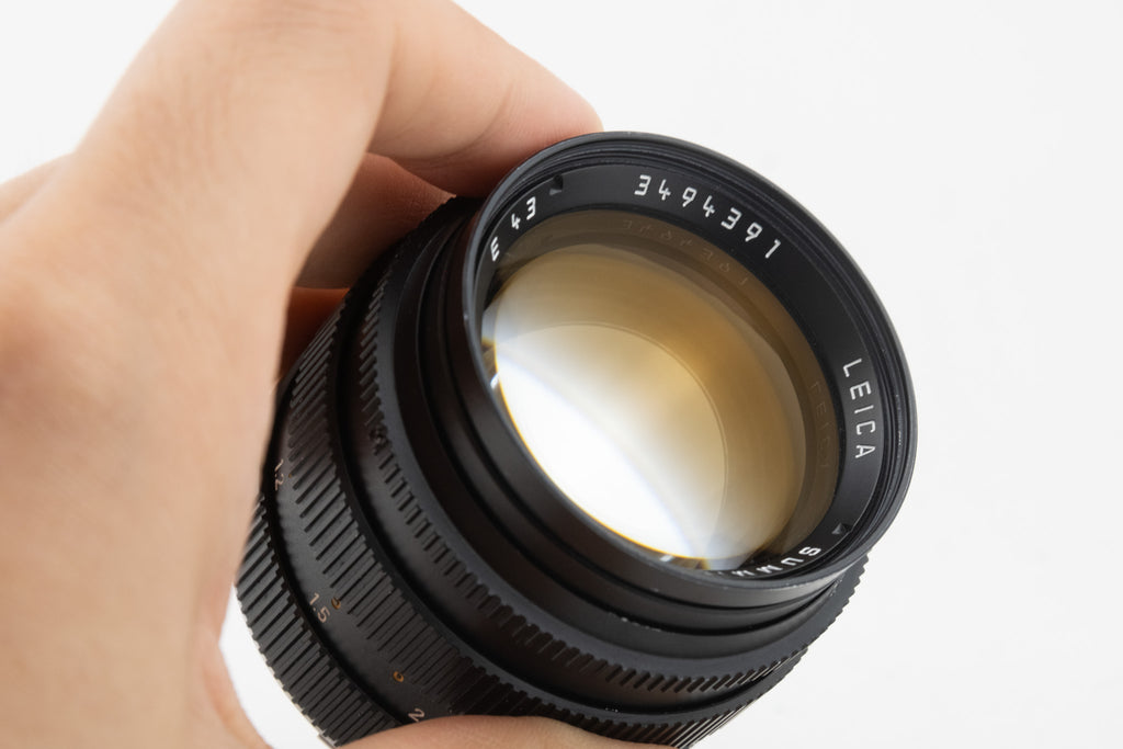 Leica Summilux 50mm f/1.4 E43 II – schwarzes Objektiv mit Goldvergütung